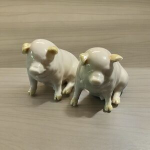 Set of 2 Belleek Ireland Pottery Pigs. Green and brown Marking.